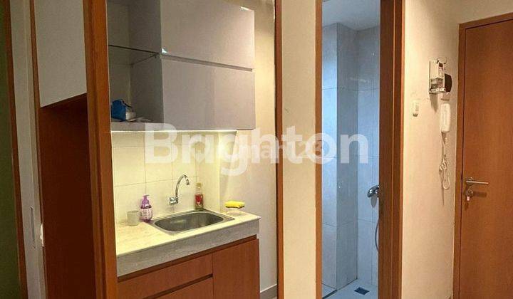 kamar tidur apartemen evenciio depok type studio