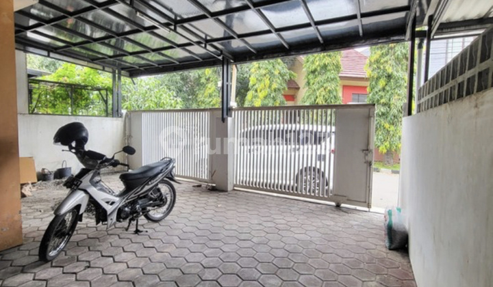 For Sale: 1.5-Story House, 163 M2. 4 Bedrooms, Move-In Ready. In a 24-Hour Security Gated Community. Community Facilities Include Playground, Tennis Court, Mosque. Antapani, Bandung.