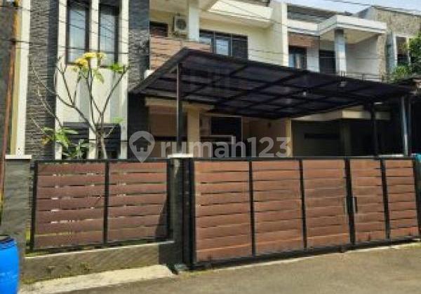 For Sale Nice 2-Story House, Land Area 118m2, 3+1 Bedrooms, One Gate Security System, 24-Hour Security, Near Public Facilities, Schools, Graha Bunda Hospital, Toserba Griya, Kiara Artha Park, Antapani Bandung.