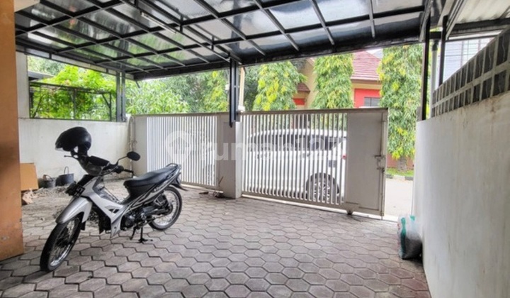 For Sale: 1.5-Story House, 163 M2. 4 Bedrooms, Move-In Ready. In a 24-Hour Security Gated Community. Community Facilities Include Playground, Tennis Court, Mosque. Antapani, Bandung. 2