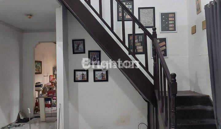 RUMAH DI PINGGIR JALAN RAYA 1