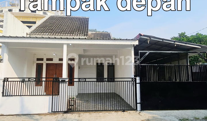 For sale: a nice minimalist house suitable for home industry due to its warehouse and wide road access for trucks. 1