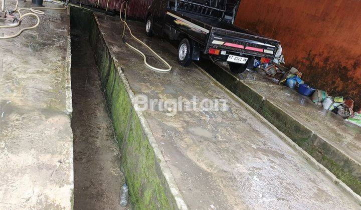 Tempat cucian mobil pinggir jalan  1