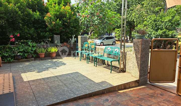 Rumah Asri Strategis di Boulevard, Harapan Indah 2