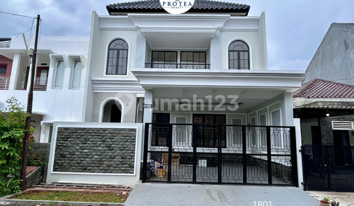 Rumah Modern dengan Row 8 di Griya Loka Bsd