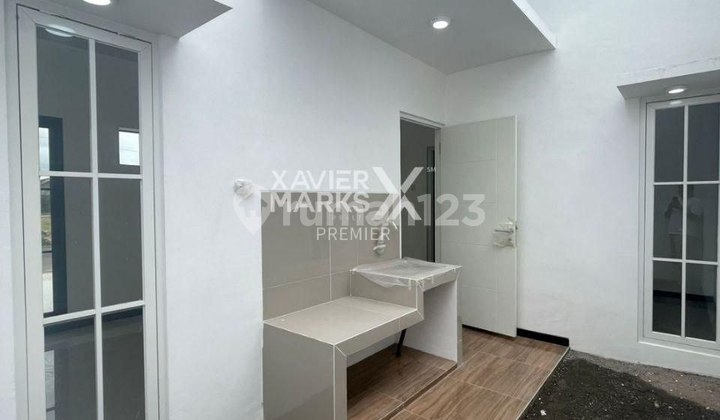 Rumah 400 Jutaan Bergaya American Townhouse Di Kota Malang