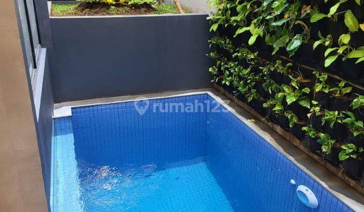 Rumah Cantik 3 Lantai Plus Kolam Renang di Kawasan Elit Pondok Indah Jakarta Selatan 1