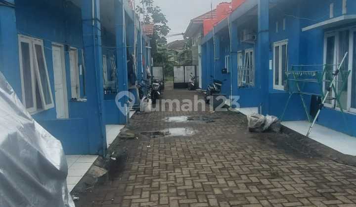 12-Door Boarding House and 3 Active Shop Houses 2