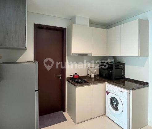 Brand New 31st Floor Apartment in Puri Mansion, West Jakarta. Sold in a Quiet Area. Categories are as Follows: - Bedrooms: 2+1 - Bathrooms: 2 - Certificate: PPJB - Furniture Condition: Furnished - Free IPL for 2 Years - View: City View 2