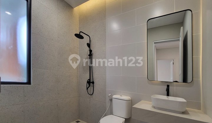 Luxury 2-Story House in Legenda Wisata with a Contemporary Concept 2