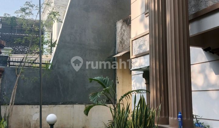 Two-Story House on Raya Puri Surya Jaya, Near Superindo 2