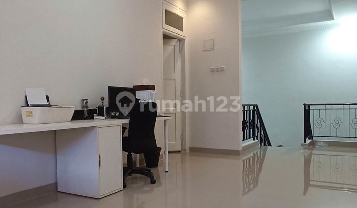 For Sale: Kota Wisata House with a Lush Atmosphere in Bogor, North-Facing. 2