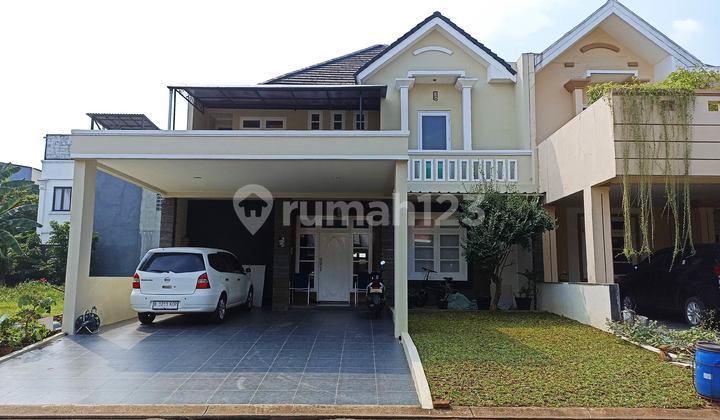 For Sale: Kota Wisata House with a Lush Atmosphere in Bogor, North-Facing.