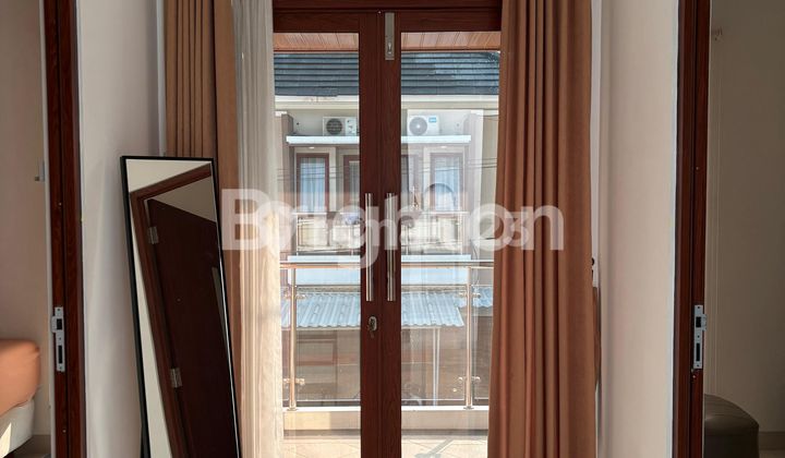 RUMAH MURAH 2 LANTAI DALAM PERUMAHAN ARJUNA MANSION 