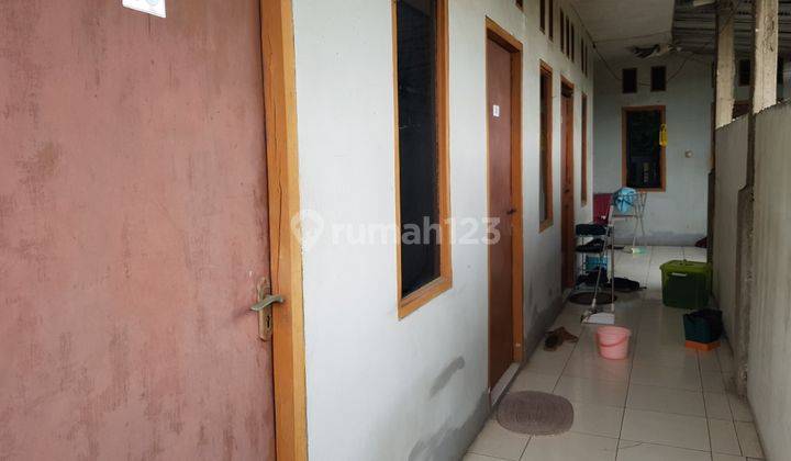 Rumah 2 Lantai ada 18 kamar cost2an, Sewaan 4 Kios, Warung Pojok  1