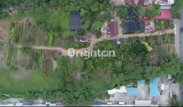 Tanah jalan lintas Medan- Tebing km 12 1
