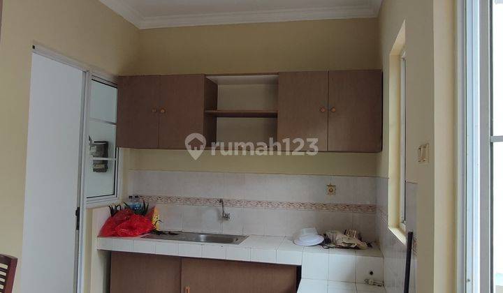 Di Kontrakkan Rumah Kota Wisata  2