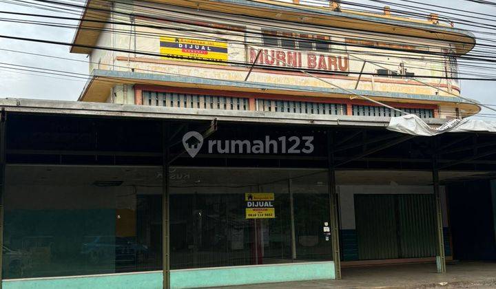 Jual Tanah dan Bangunan, cocok utk showroom, function hall, bank, Lokasi di pinggir jalan besar 1