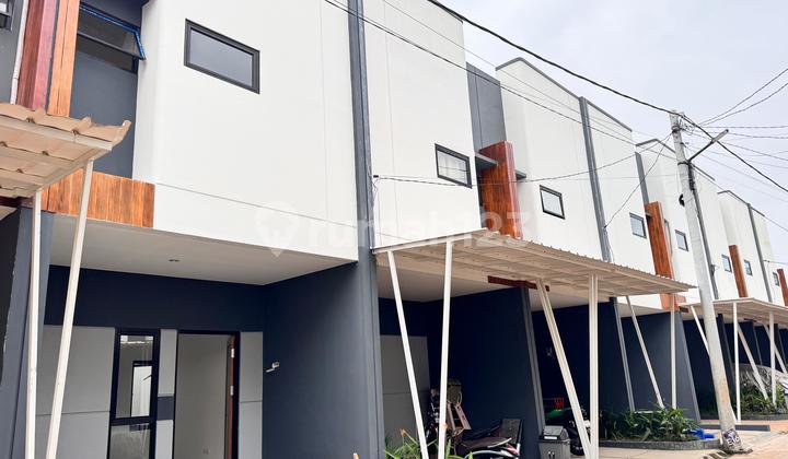 2-Story House, Only 1 Left, Ready to Move In. Options: 2 Bedrooms and 3 Bedrooms. Special Ramadan Offer: Installments Starting from Just 300 Thousand, 0% Down Payment, Free All Document Fees and Mortgage. Ready to Live In. Complete Public Facilities in Sawangan. 2