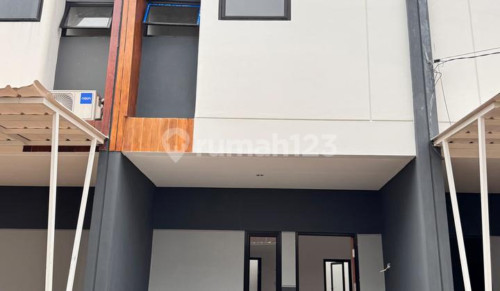 2-Story House, Only 1 Left, Ready to Move In. Options: 2 Bedrooms and 3 Bedrooms. Special Ramadan Offer: Installments Starting from Just 300 Thousand, 0% Down Payment, Free All Document Fees and Mortgage. Ready to Live In. Complete Public Facilities in Sawangan. 1