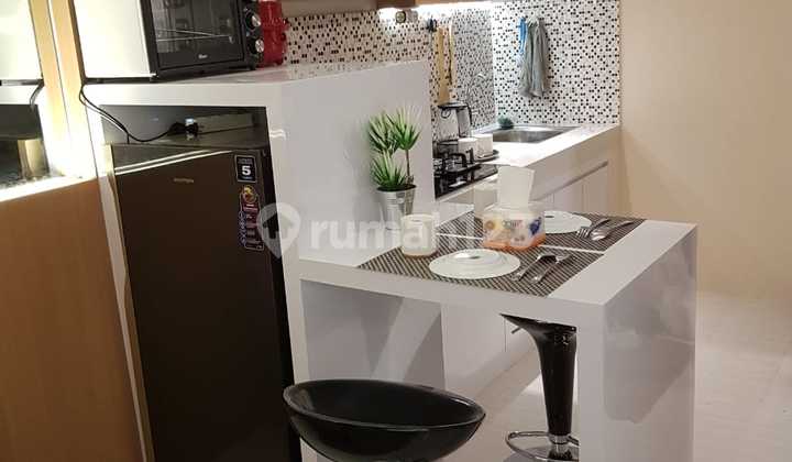 Jual Rugi Apartemen Puncak Dharmahusada 2 Bedroom