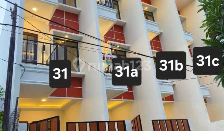 For Rent New 4-Story House in Taman Ratu, West Jakarta, Close to Ciputra Mall, Central Park Mall, and Taman Anggrek Mall.