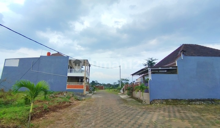 For sale, strategic land plot for 2 million near the toll gate.