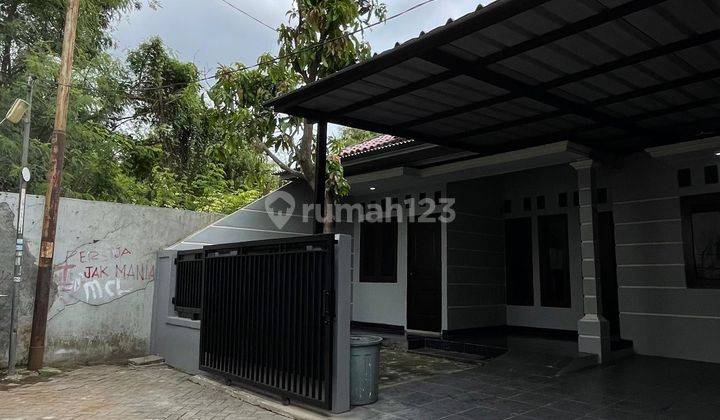 garasi/carport dijual rumah siap huni, 5
