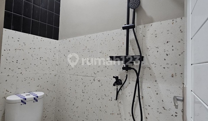 House with Red Brick Specs Near Cimanggis Toll Road.