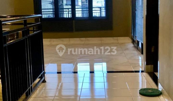 Good Semi-Furnished Rental House with SHM, 2 Carports in Graha Raya Bintaro, South Tangerang Good Semi-Furnished Rental House with SHM, 2 Carports in Graha Raya Bintaro, South Tangerang