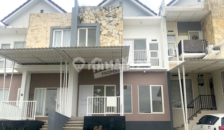 Ready-to-Occupy Well-Maintained House, Semi-Furnished with 3 Bedrooms and 2 Floors, Located in Tidar Area of Bridgetown Housing Estate, Dau Subdistrict, Malang Regency.