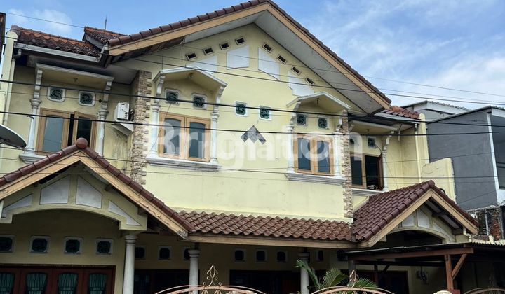 RUMAH DEPOK DIPINGGIR JALAN