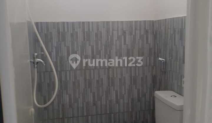 Quick Sale Front Cluster House in Citra Indah City, Red Brick Building