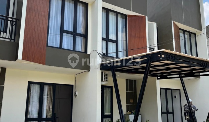 Nice 2-story semi-furnished house with SHM, close to Gandul, Depok. Nice 2-story semi-furnished house with SHM, close to Gandul, Depok.