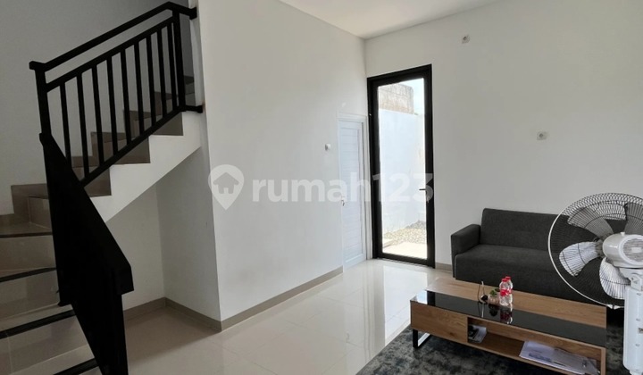 Nice 2-story semi-furnished house with SHM, close to Gandul, Depok. Nice 2-story semi-furnished house with SHM, close to Gandul, Depok.