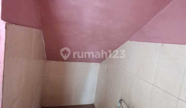 Two-story shop house on Pulau Damar Street, Lampung