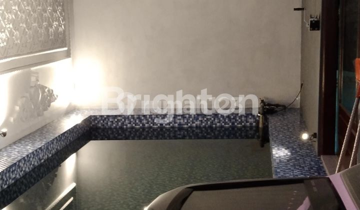 Rumah mewah fasilitas kolam renang di untung suropati lampung 2