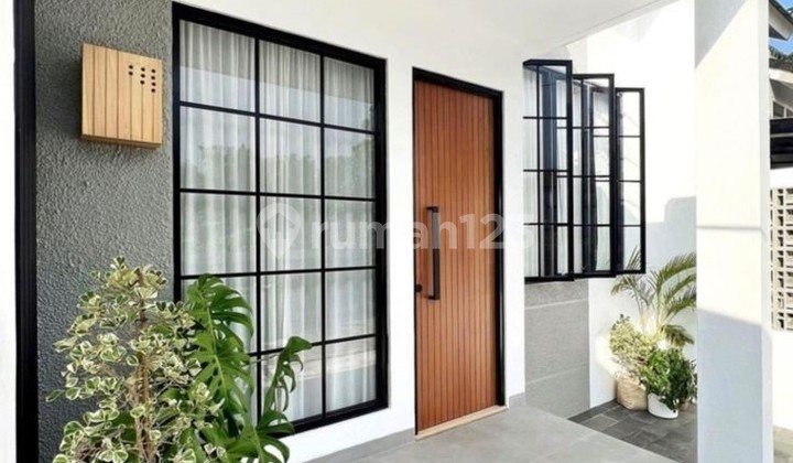 Rumah Dengan Konsep Modern Contemporer Di Kawasan Berkembang