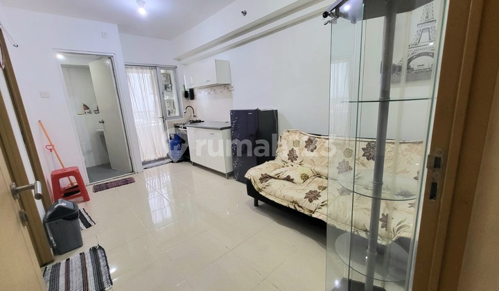 For Sale: Semi-Furnished, Well-Maintained, Ready-to-Occupy Educity Apartment in Pakuwon City.