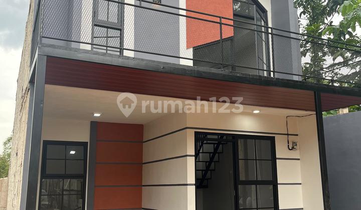 Rumah Modern dengan Konsep Mezzanine + Rooftop