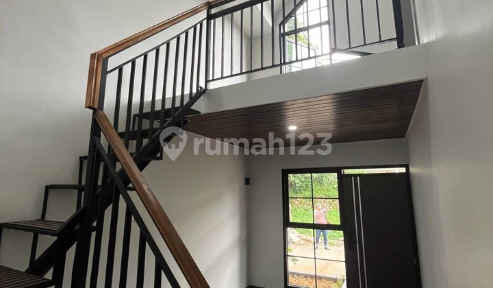 Rumah Modern dengan Konsep Mezzanine + Rooftop