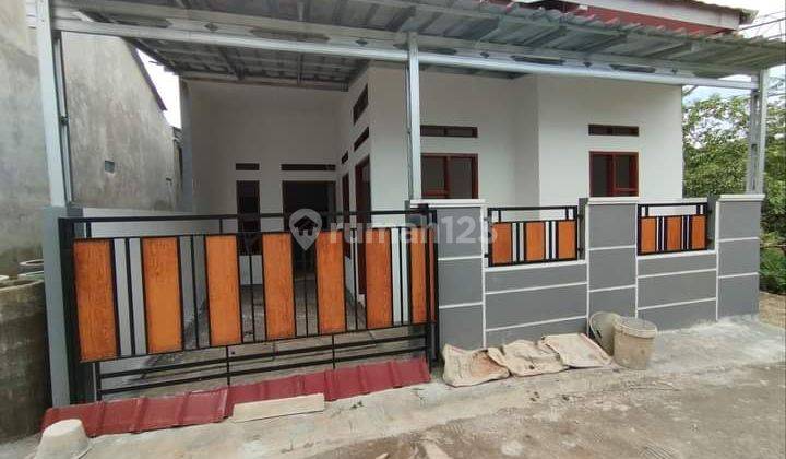 Dijual rumah minimalis pinggir jalan kampung 1