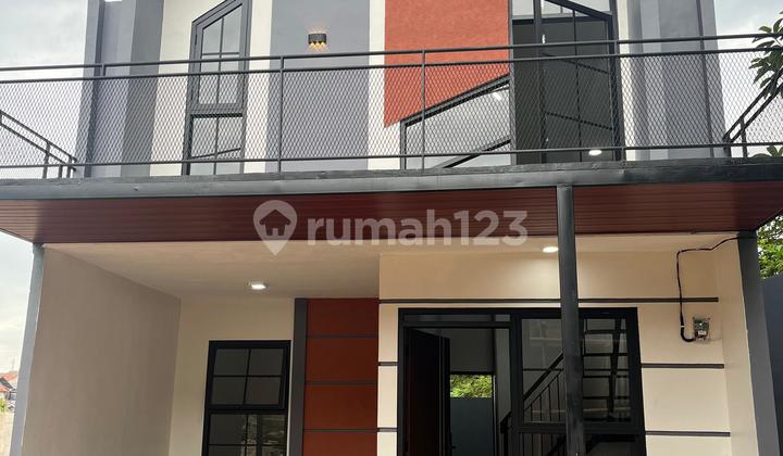 Hunian Modern dengan Konsep Mezzanine + Rooftop Hunian Modern dengan Konsep Mezzanine + Rooftop