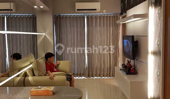 For Rent: 9th Floor 2BR Apartment at Puncak Bukit Golf, Fully Furnished with Pool View, Just a Step Away to Citraland and Pakuwon Mall