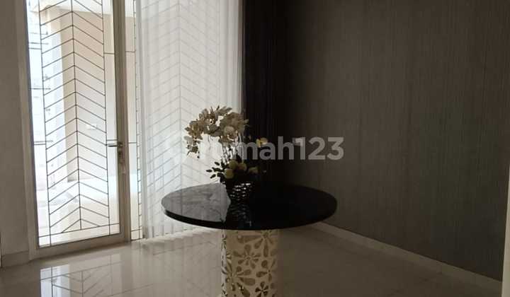 For Rent: The Mansion Pakuwon Indah 2-Story House, 112m² Area, Semi-Furnished, Near Pakuwon Mall, West Surabaya