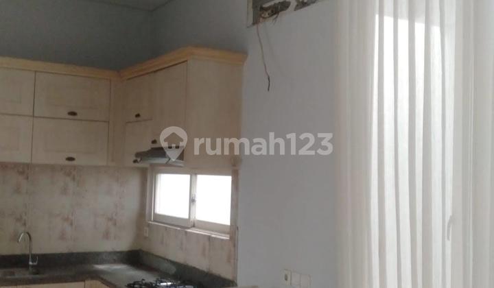 For Rent: Pakuwon Indah House Ready to Live In Minimalist Semi-Furnished 2 Floors 3 Bedrooms Land Area 162m² Near Pakuwon Mall West Surabaya 2