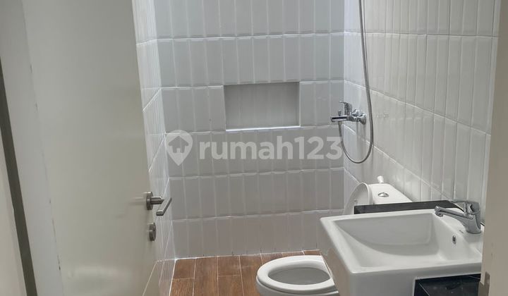 For Rent: Well-Maintained Minimalist House, Ready to Occupy, Green Nature, Citraland, Area 100m², 2 Bedrooms, Near Pakuwon Mall, West Surabaya