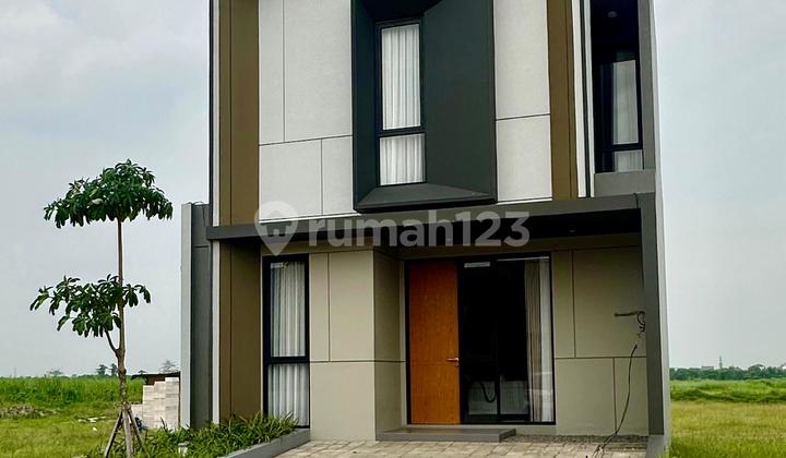 Two-Story New House in Moca City Sidoarjo by Dian Istana