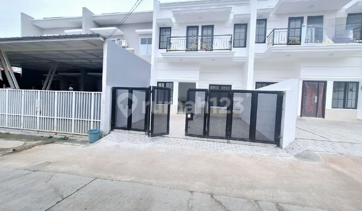 Large, luxurious, cheap new house free at Kodau Jati Mekar Bekasi City, close to Ratna Jati Bening Bekasi.