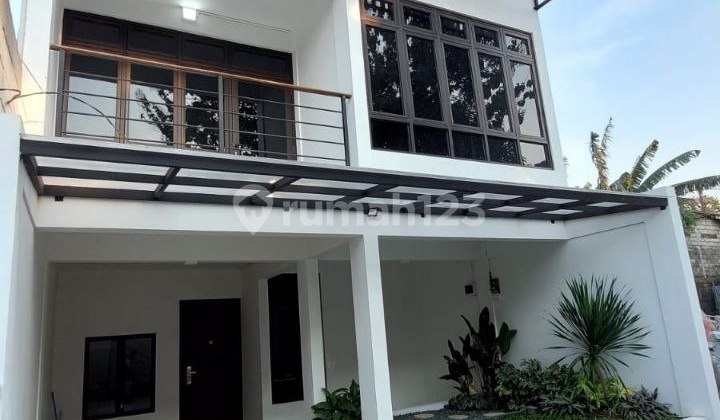 Two-Story Apartment Concept House Plus Rooftop, Full Concrete Attractive Modern Design in Jati Bening Two-Story Apartment Concept House Plus Rooftop, Full Concrete Attractive Modern Design in Jati Bening